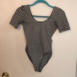 Black and white drop back body suit